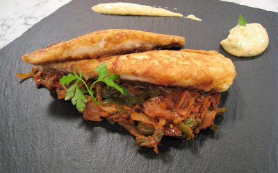 Dorada rebozada con sofrito