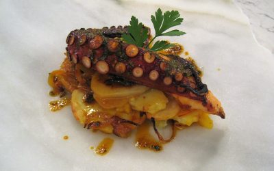 Pulpo seco con patatas al vino