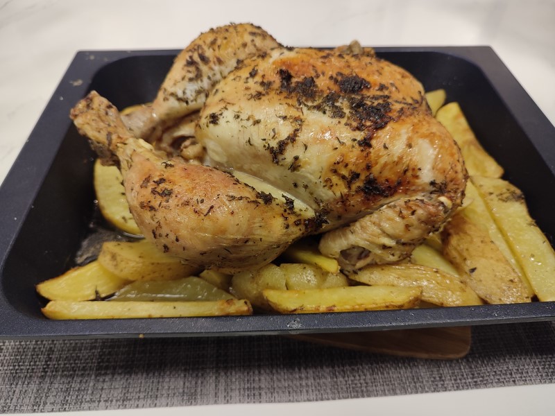 Pollo asado en manteca